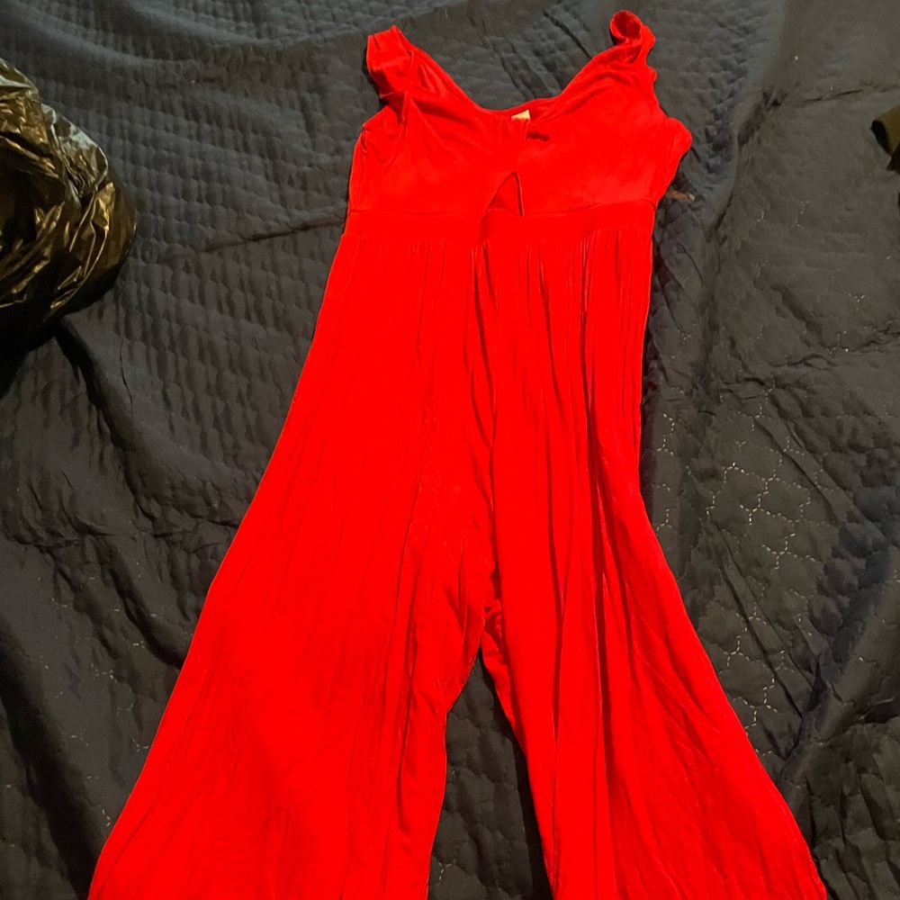 Red relaxed fabric jumpsuit with keyhole design